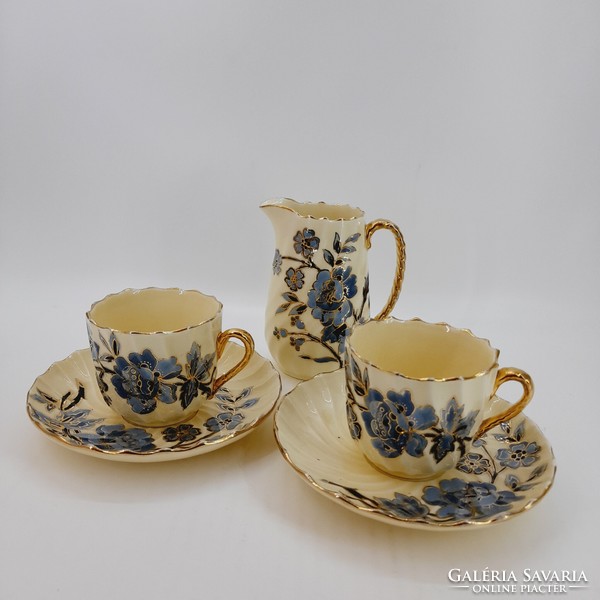 Pair of antique earthenware cups and spouts