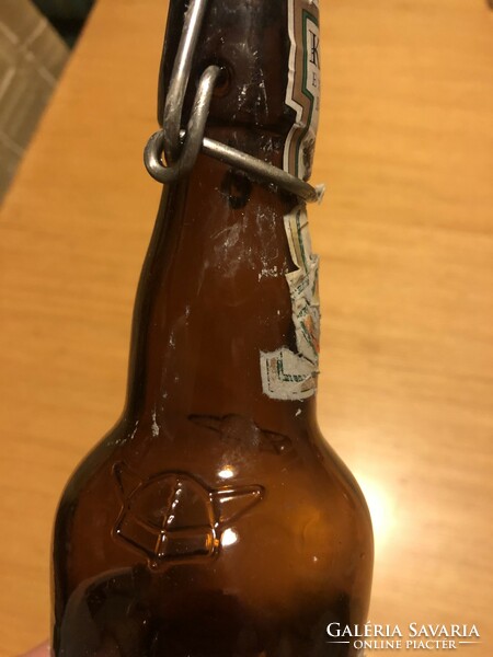 3 beer bottles with buckles