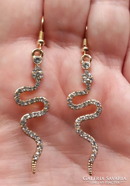 Gold-plated rhinestone snake earrings.