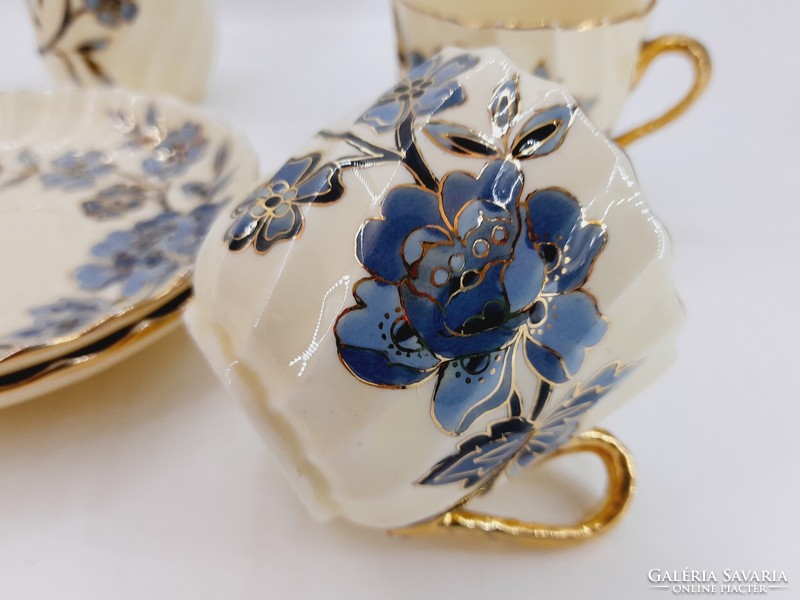 Pair of antique earthenware cups and spouts