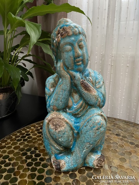 Turquoise glazed ceramic buddha statue