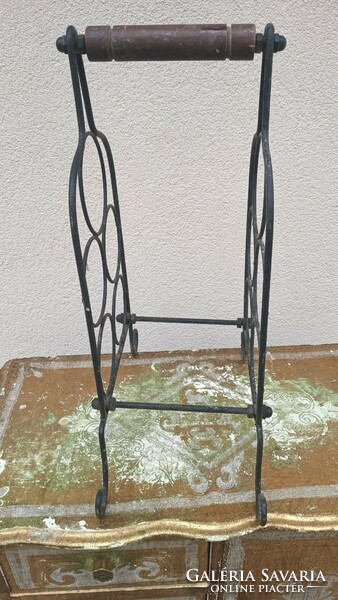 Wrought iron wine holder is negotiable