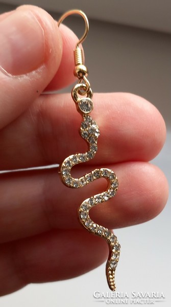 Gold-plated rhinestone snake earrings.