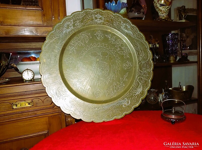 A huge Chinese bronze or copper bowl with a dragon