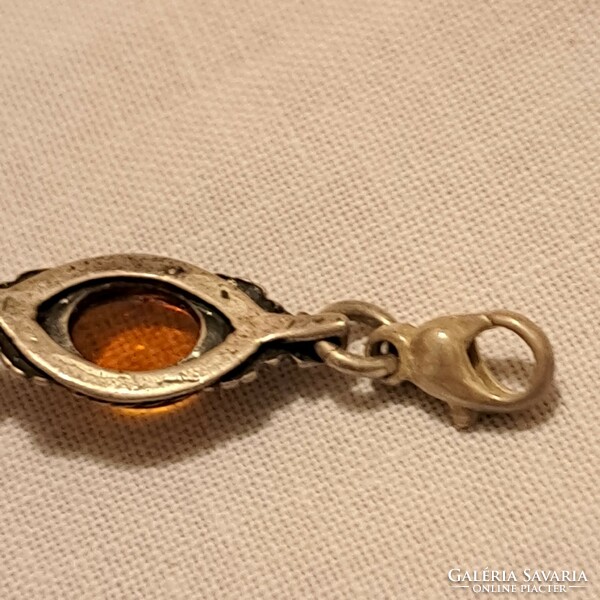 Silver bracelet with amber stones