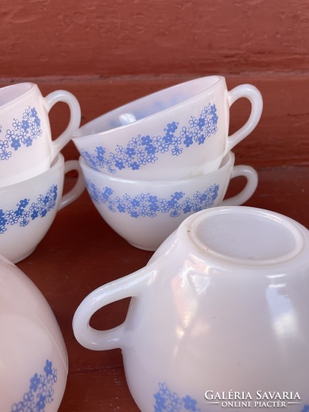 Milk glass tea cup cup with blue pattern