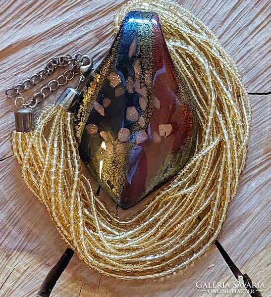 A wonderful multi-row Murano glass necklace with a huge pendant