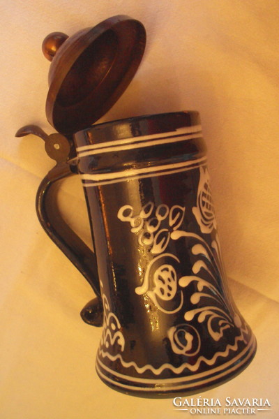 Beer mug with blue glaze, white flower motif, openable red copper cap, with monogram marking.