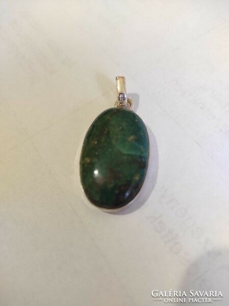 Handmade chrysocolla pendant with a silver socket