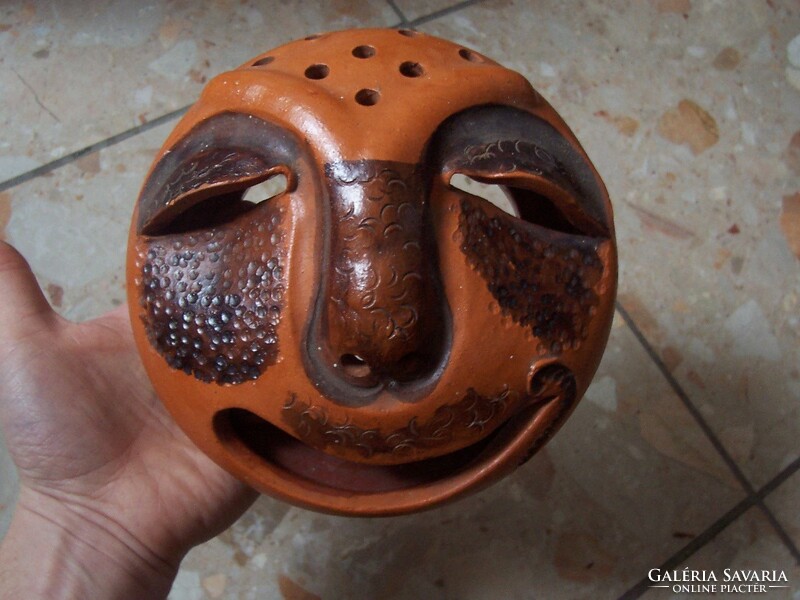 Wall ceramic cheerful head