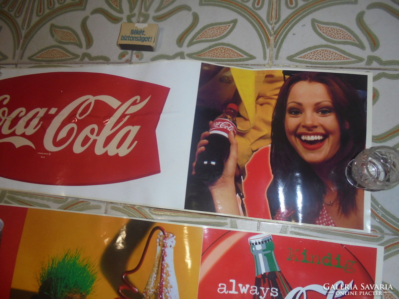 Three retro Coca-Cola advertising stickers together