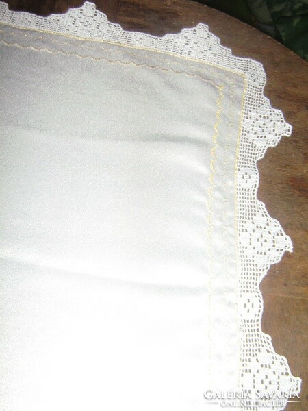 Beautiful elegant rose with lace insert and silk tablecloth with lacy edges