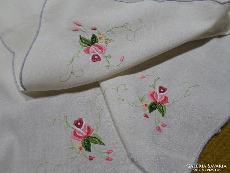 Embroidered pink, azure cotton tablecloth.