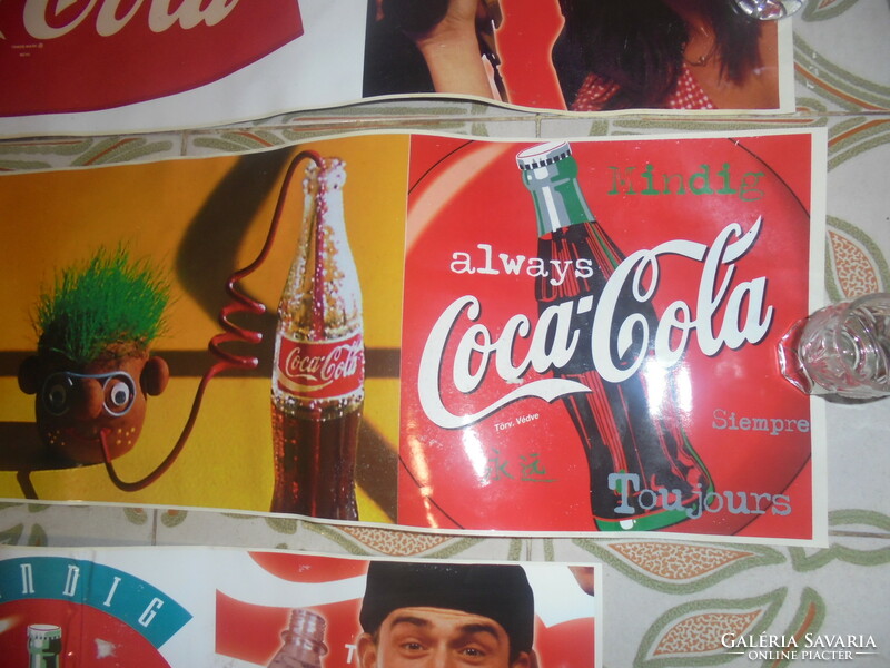 Three retro Coca-Cola advertising stickers together