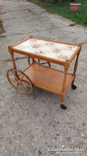 Antique wooden cart with porcelain tile roof