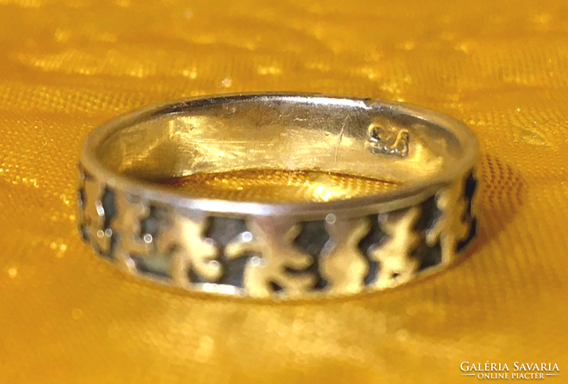 Silver hoop ring with a teddy bear motif dancing in a circle