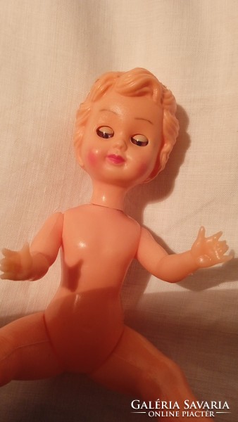 Old plastic sleeping doll