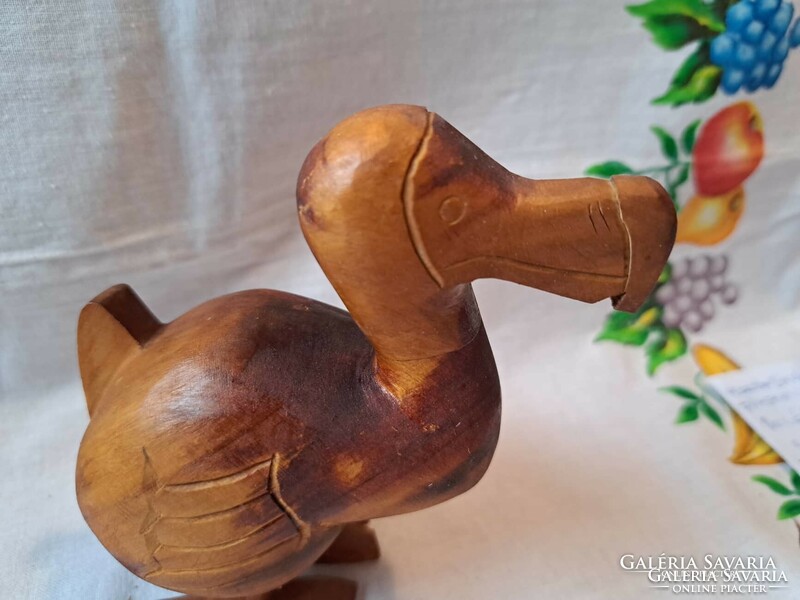 Wooden dodo bird worn and scratched