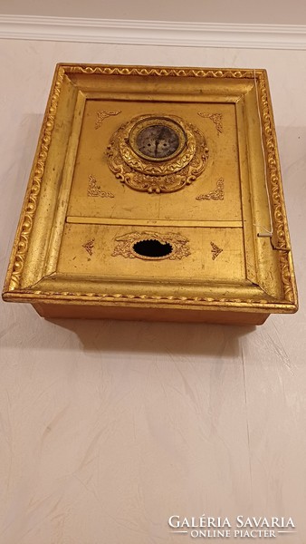 Antique Biedermeier frame clock in an ox-eye laminated frame. Wall clock.