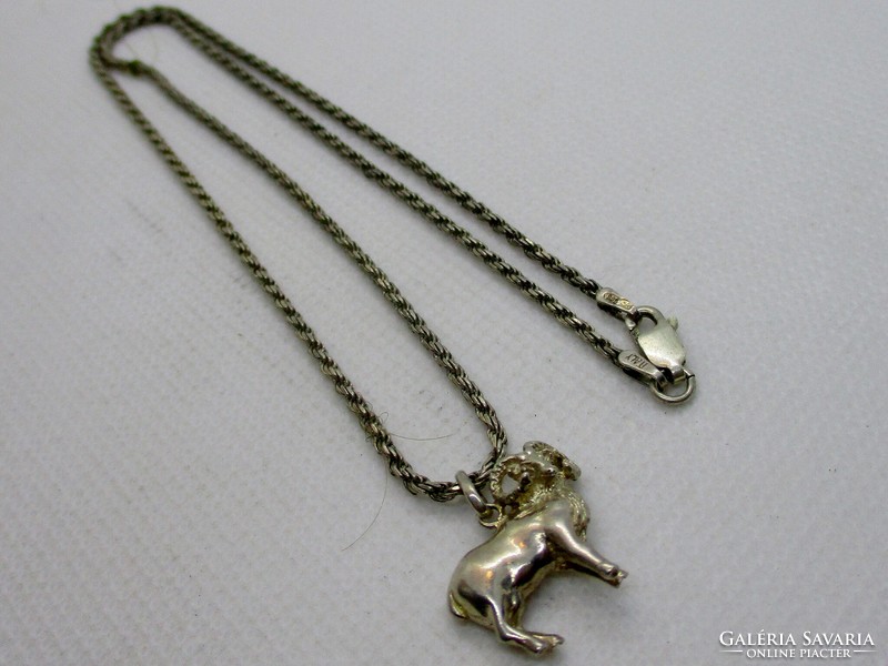 Special old handcrafted ram silver pendant on a silver necklace