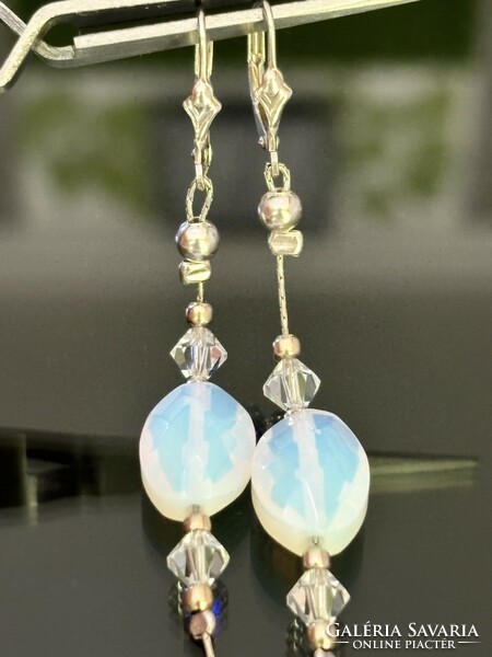 Beautiful silver earrings embellished with a pair of moonstones