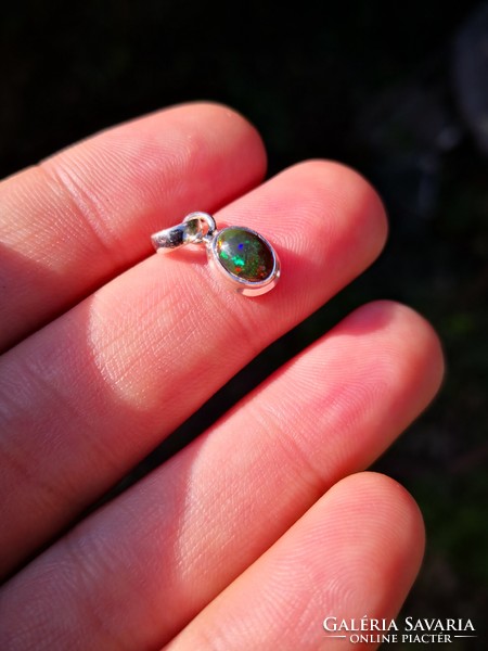 Beautiful silver pendant with black opal stones