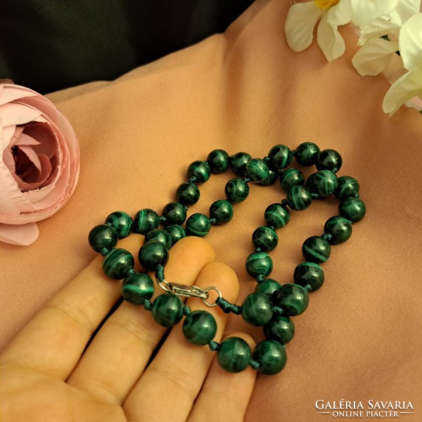 Malachite beads are the stone of perseverance