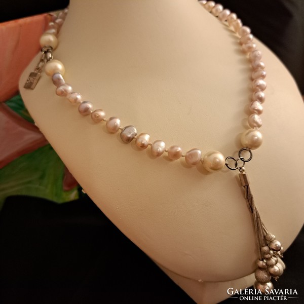 Snö marked exclusive freshwater asymmetric string of pearls