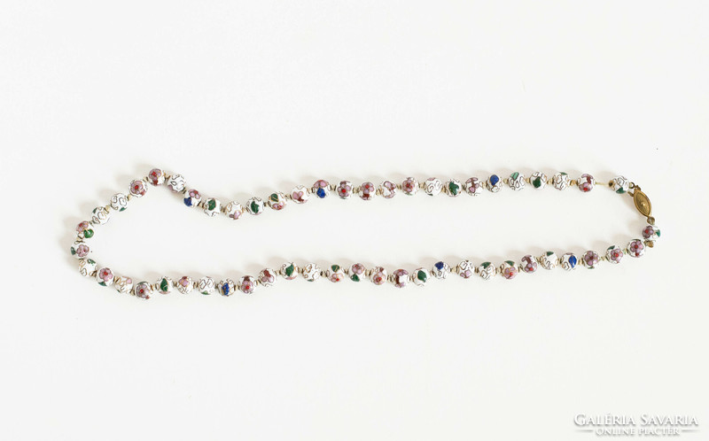 Antique necklace strung with metal pearls decorated with compartmental enamel