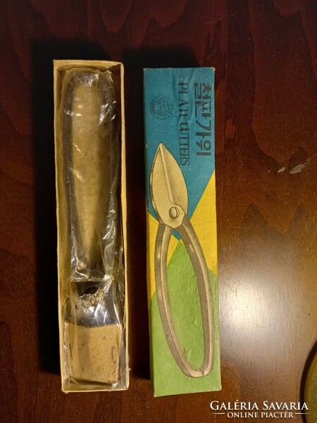 Old pruning shears in their original box, never used.