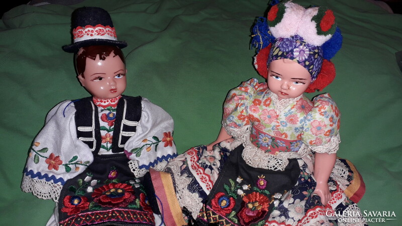 A pair of large antique Hungarian Matyó celluloid dolls in very nice condition, each 32cm/each according to the pictures