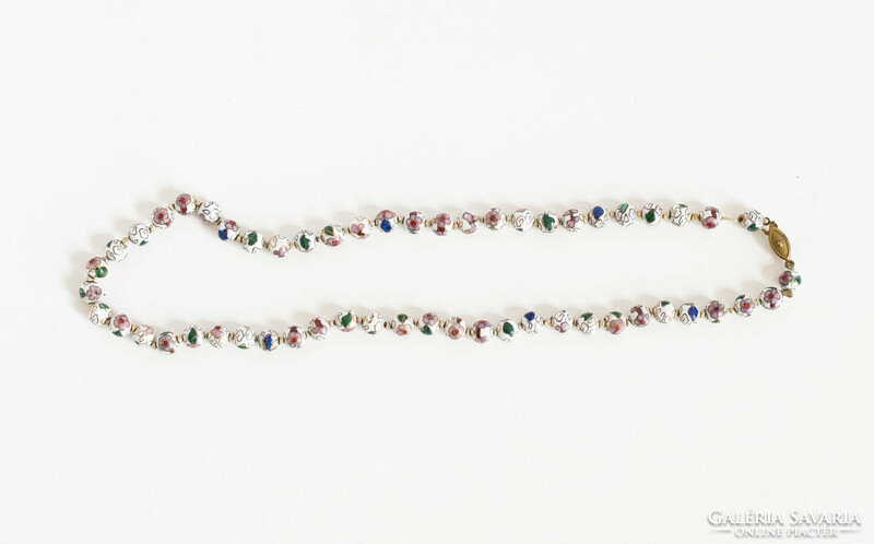 Antique necklace strung with metal pearls decorated with compartmental enamel