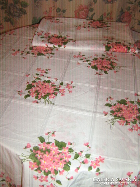 Beautiful vintage pink bed linen set with a bouquet of violets