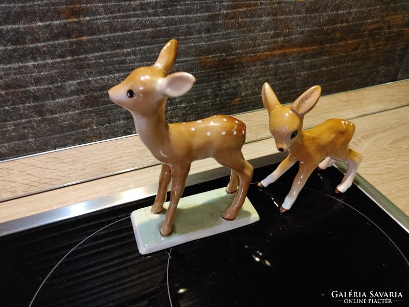 Deer porcelain figurines with broken /repaired/legs