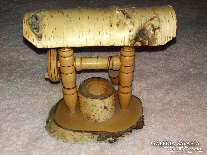 Needlework wood carving with small wheeled bucket