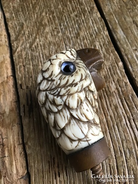 Parrot head carved from antique tusk with stick-end horn, damaged