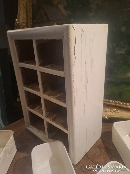 Old painted 8-drawer wooden spice rack with earthenware drawers