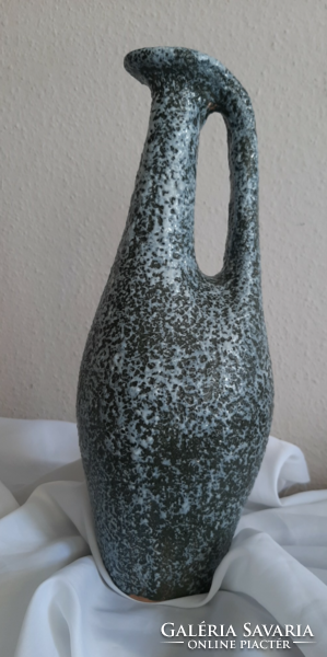 A large retro ceramic vase with a wonderful shape is probably from a plague cold well