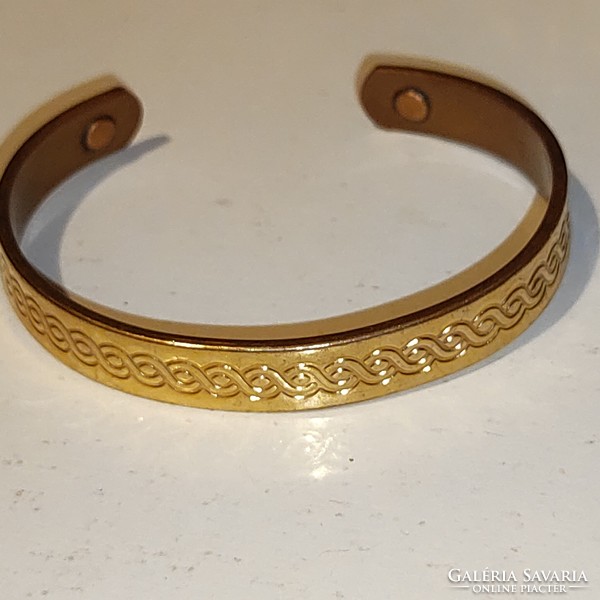 Numbered gilt copper English bracelet