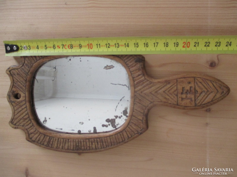 Old mirror with handle, monogram h.E