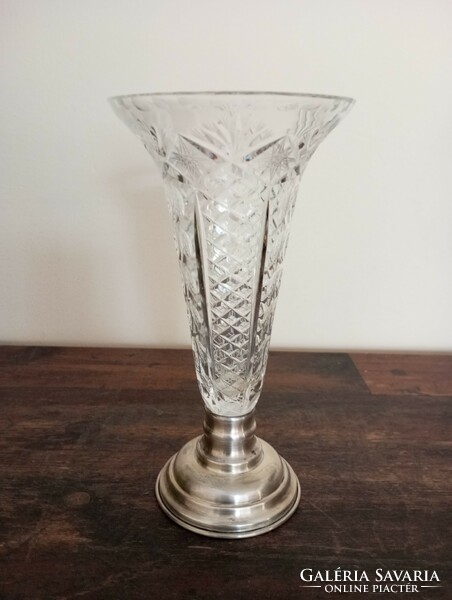 Crystal vase on a silver-plated base