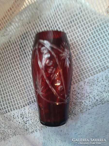 The burgundy polished vase is beautiful