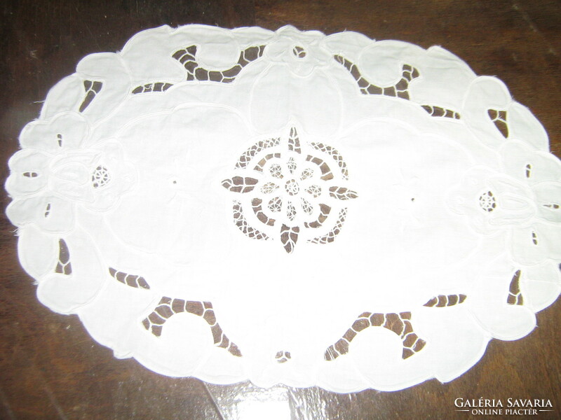 Charming white oval sewn lace tablecloth