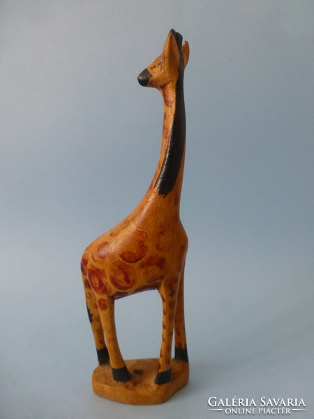 Carved wooden giraffe statue