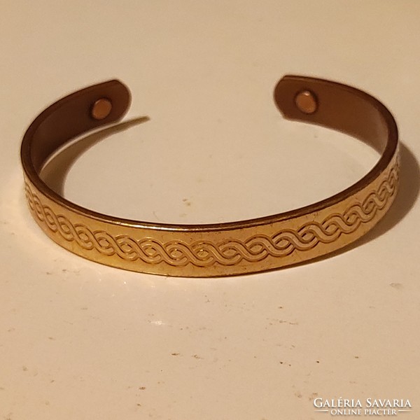 Numbered gilt copper English bracelet