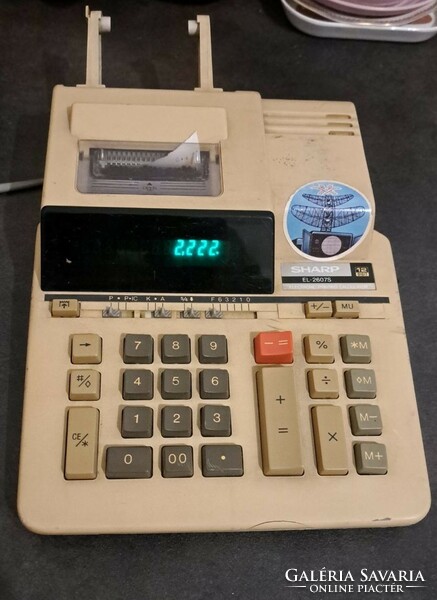 Retro sharp calculator with green display,