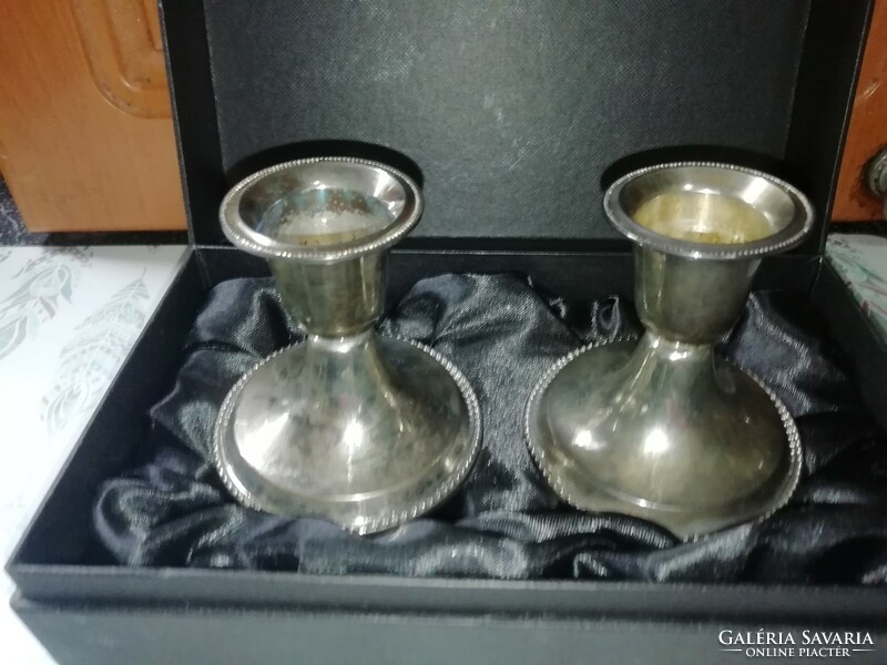 A pair of candle holders in a gift box, silver-plated