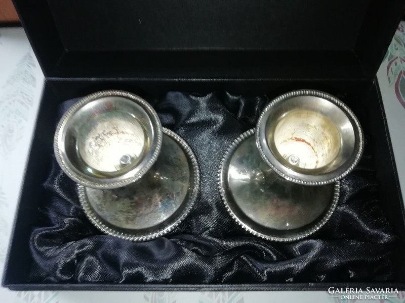 A pair of candle holders in a gift box, silver-plated