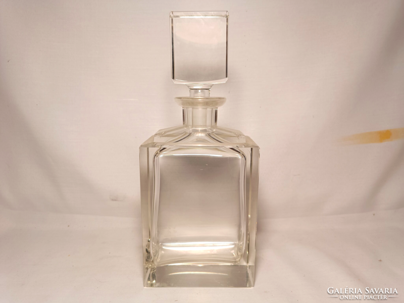 Polished liquor bottle with a small flaw