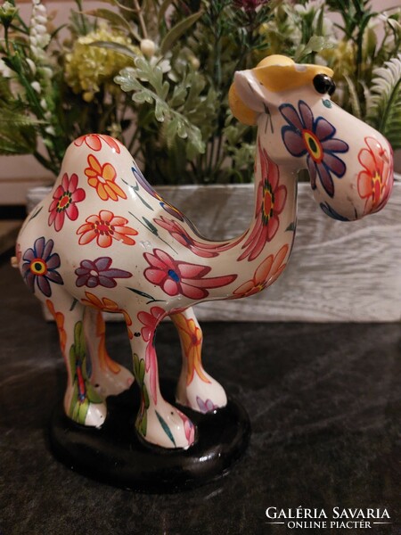 Camel with floral ceramic hat